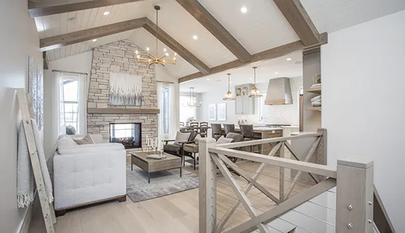 Spacious home interior with a high ceiling and exposed beams, highlighting cash for house services in Spokane, WA.